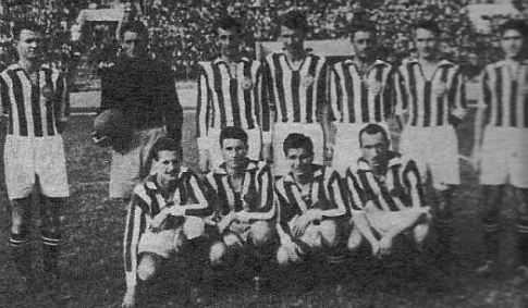 Šampionska ekipa Partizana. Stoje (sleva): Bobek, Šoštarić, Čolić, Drenovac, Jovanović, Herceg i Jakovetić. Čuče (sleva): Lazarević, Valok, Šijaković i Atanacković.
